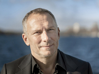Poträttbild av Gustaf Skördeman