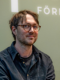 Poträttbild av Mark Wallenius